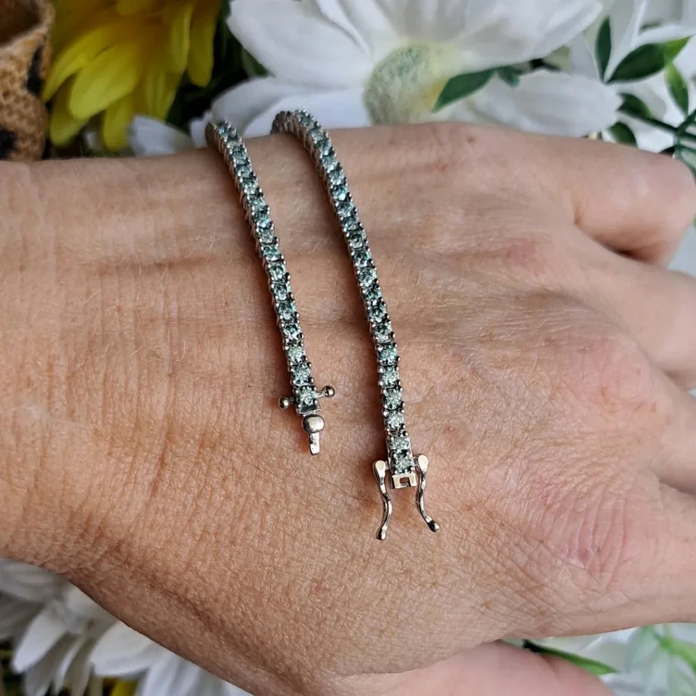 Genuine Blue Moissanite Tennis Bracelet In 925 Sterling Silver.